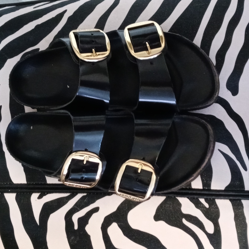 Black patent leather Birkenstocks sandals
